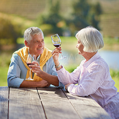 Buy stock photo Cropped shot of a senior couple out for a wine tasting