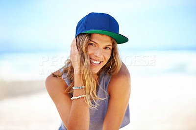 Buy stock photo Shot of an attractive young woman at the beach