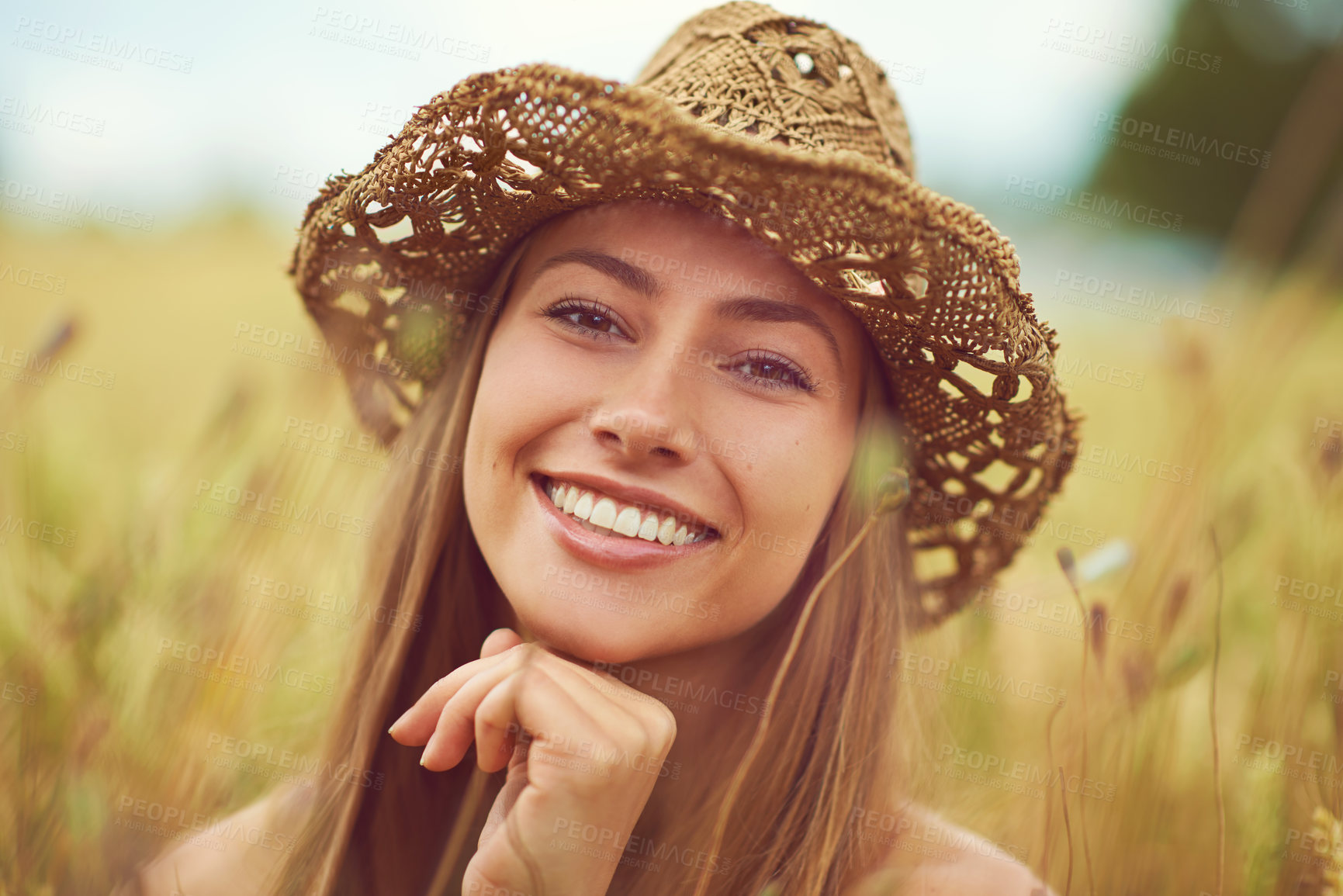 Buy stock photo Portrait, wheat field and woman with smile, travel and wellness with adventure, countryside and summer holiday. Face, person and girl with hat, outdoor and calm with happiness, nature and environment