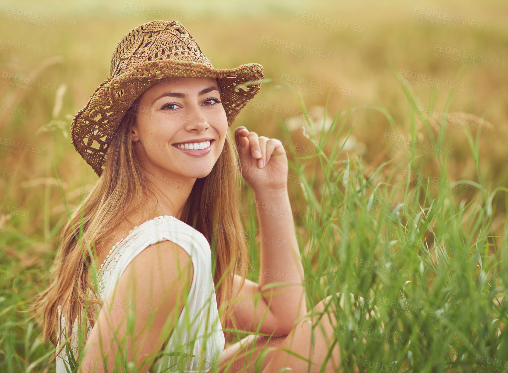 Buy stock photo Portrait, wheat field and woman with adventure, nature and travel with wellness, countryside and summer holiday. Face, person and girl with hat, outdoor and calm with journey, happy and environment