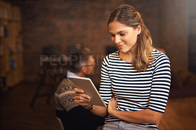 Buy stock photo Cropped shot of a young businesswoman sitting in the boardroom