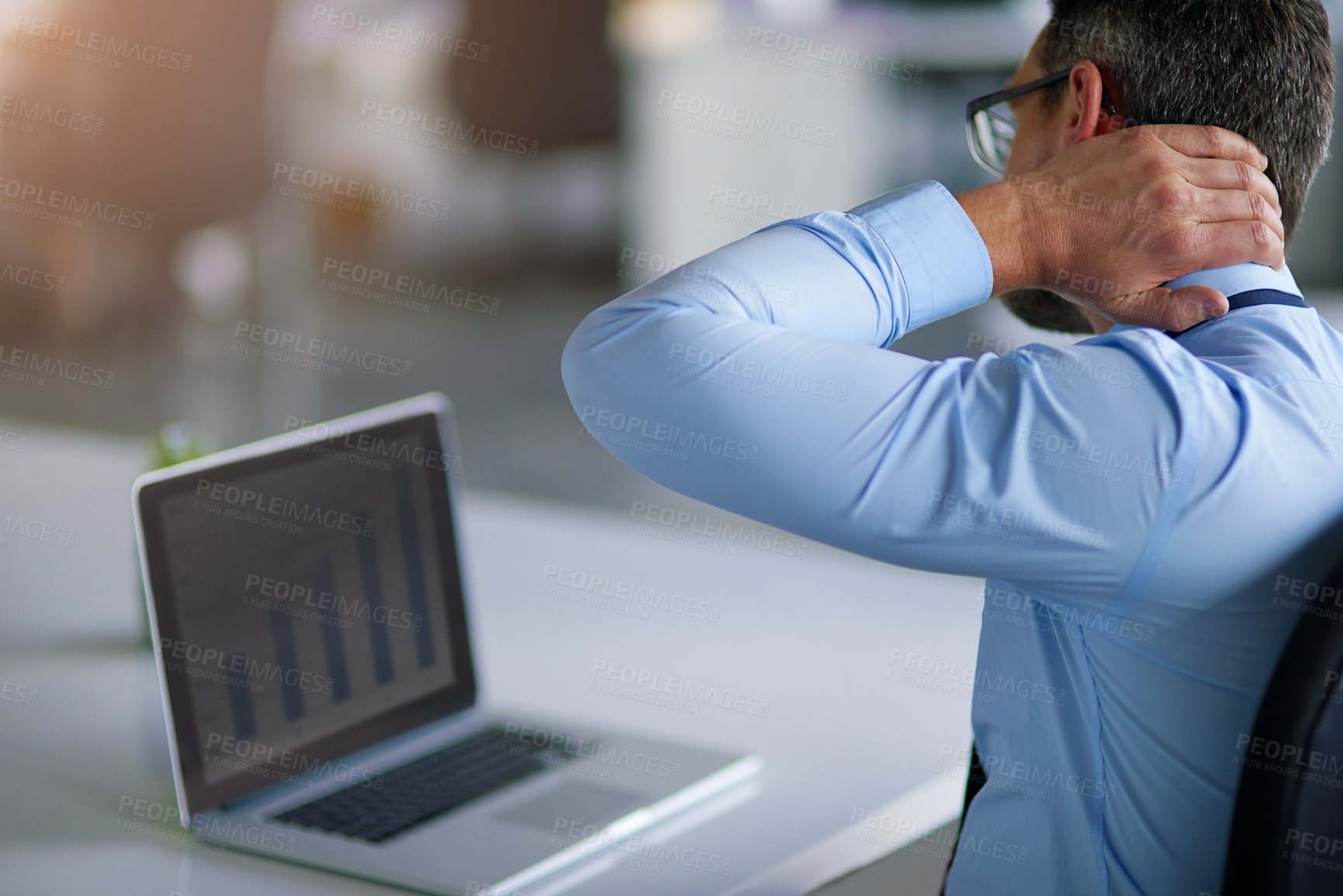 Buy stock photo Shot of a businessman suffering from neck pain