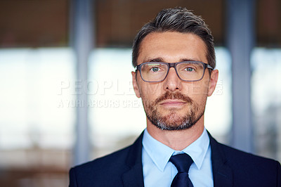 Buy stock photo Portrait of a confident businessman in an office