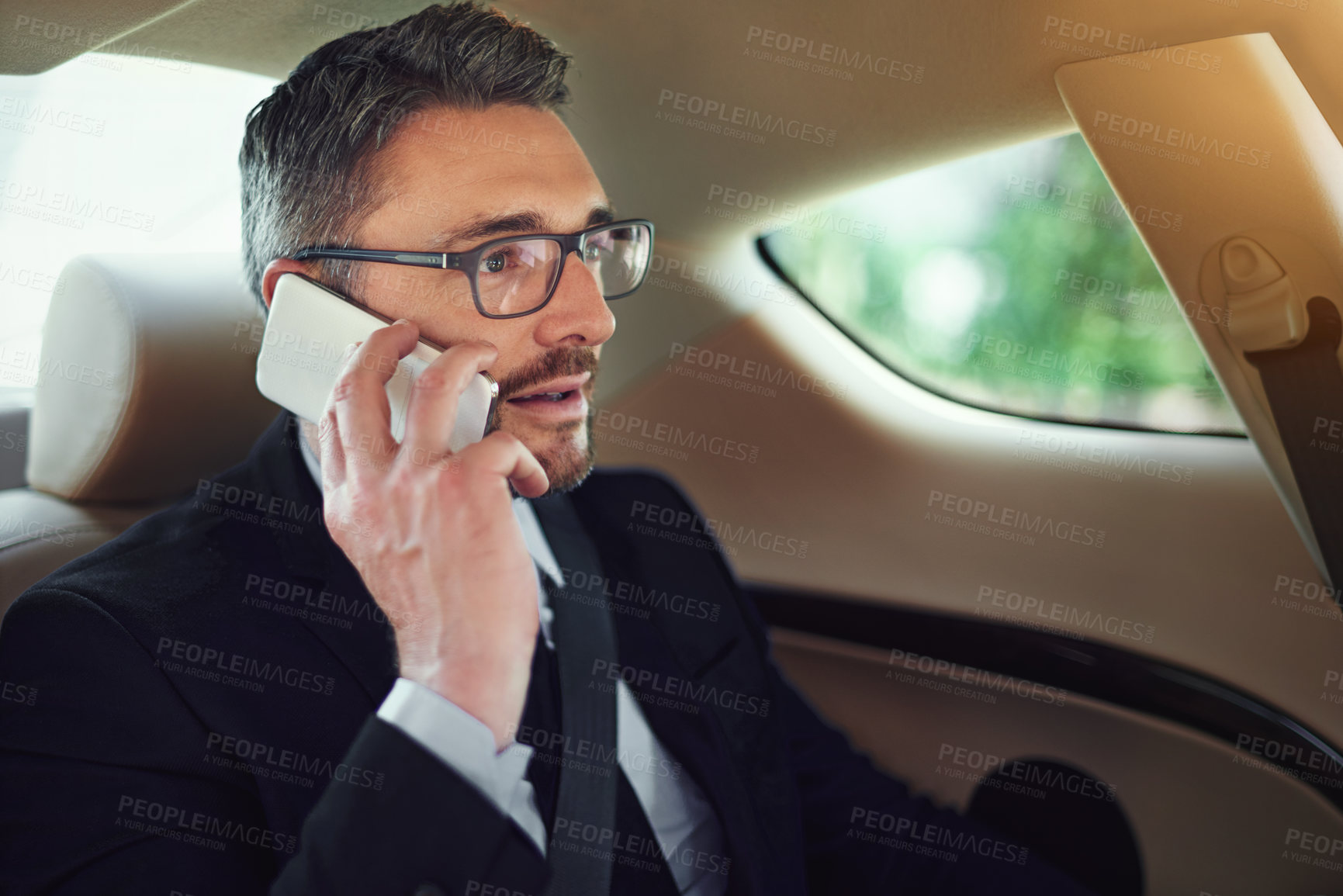 Buy stock photo Man, phone call and travel in car for conversation, networking or listen for deal for company. Person, vehicle and smartphone for thinking, transportation or commute with negotiation on business trip