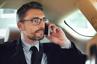 Buy stock photo Business man, phone call and thinking in car for travel, networking or decision for company. Person, vehicle and smartphone on ride, transportation and listen with chat in negotiation for agreement