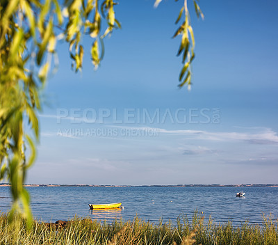 Buy stock photo Ocean, water and tourism with boat, blue sky or trees for vacation and environment. Brazil, outdoor nature or scenic view of island, sea and beach in Rio de Janeiro for eco travel destination