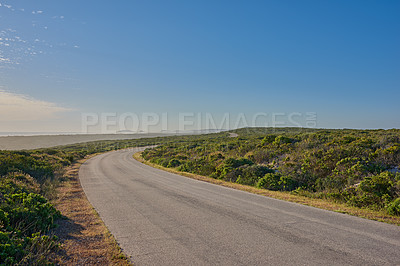 Buy stock photo Sky, countryside and road with nature for trip, drive and travel on holiday in Kenya. Outdoor, adventure and tourism with sustainability, leisure and vacation with asphalt for break and journey