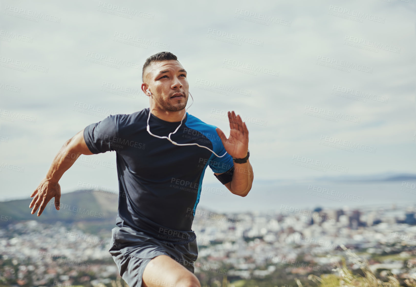 Buy stock photo Cropped shot of a young man running outdoors