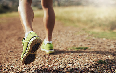 Buy stock photo Rearview shot of a man running outdoors