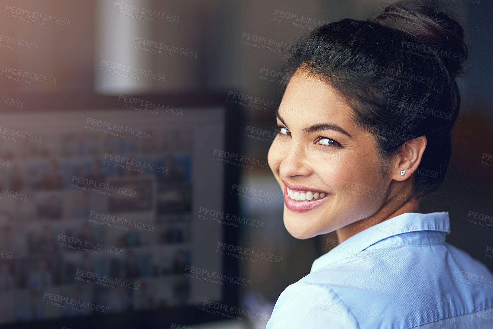 Buy stock photo Cropped portrait of a young businesswoman sitting at her office computer