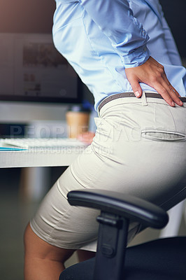 Buy stock photo Cropped shot of a businesswoman suffering from back pain