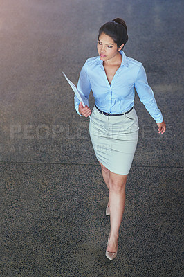 Buy stock photo Walking, confidence and woman with documents in office lobby with report at professional legal consultancy. Lawyer, business advisor and businesswoman with files, folder and paperwork at law firm