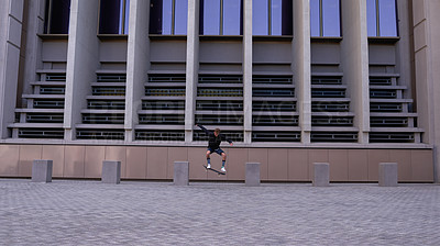 Buy stock photo Shot of skateboarders in the city