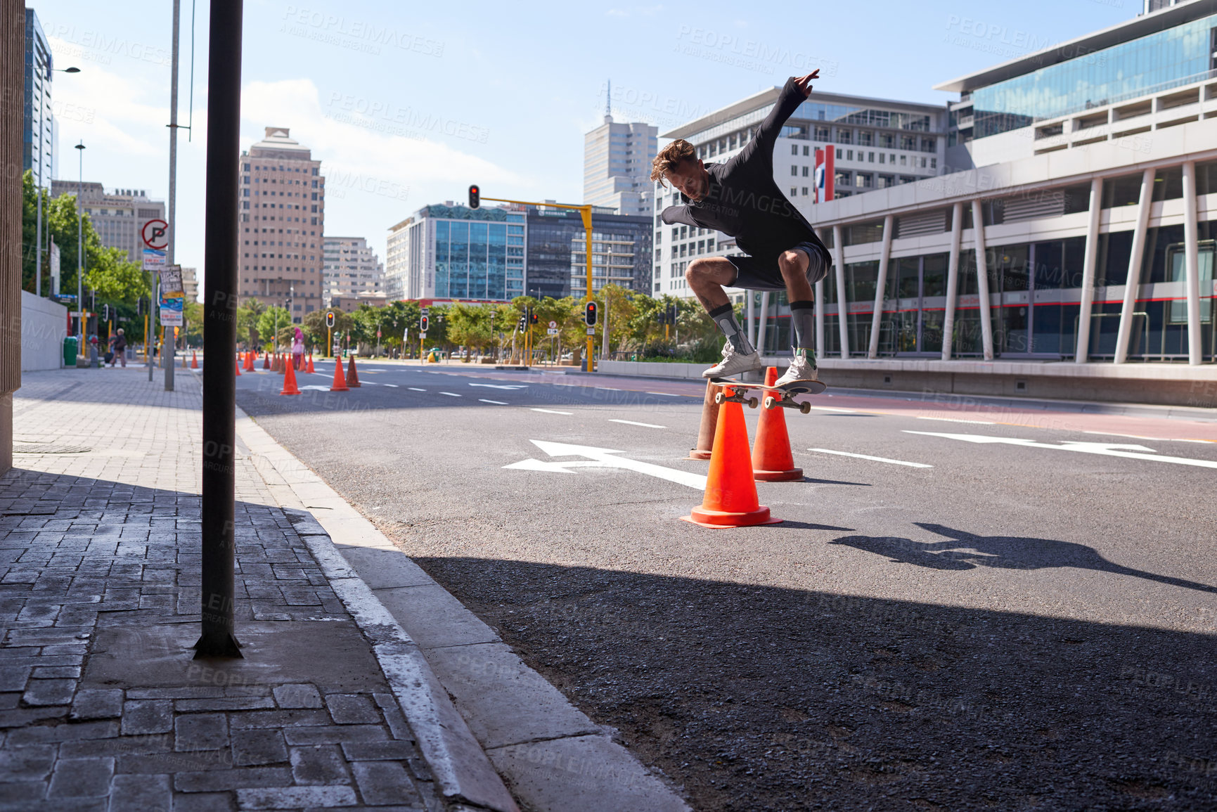 Buy stock photo Shot of skateboarders in the city