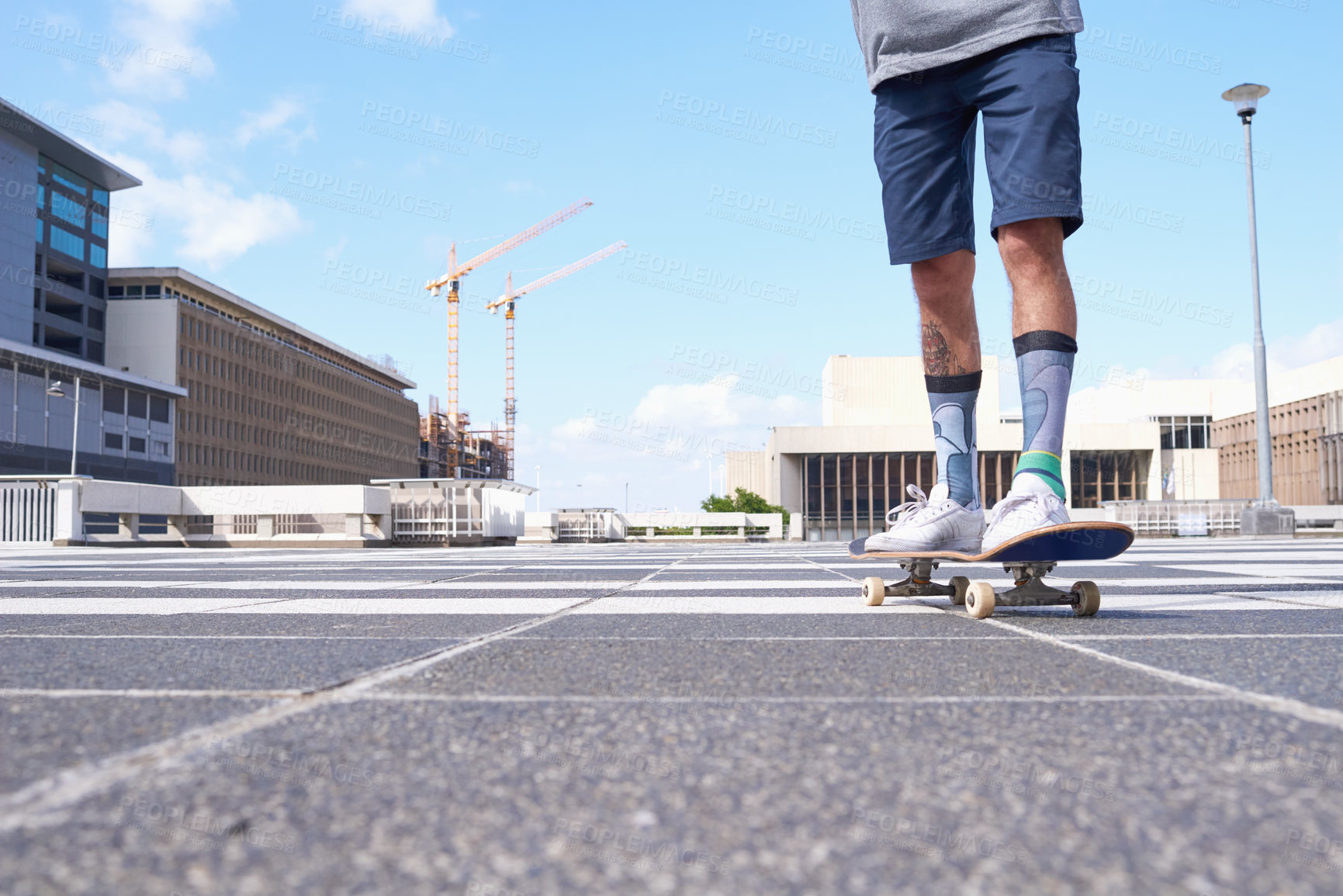 Buy stock photo Shot of skateboarders in the city