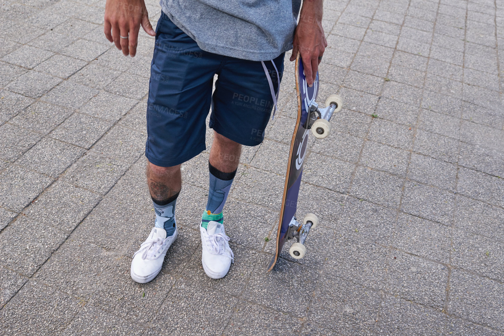 Buy stock photo Shot of skateboarders in the city