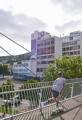 Buy stock photo Shot of skateboarders in the city