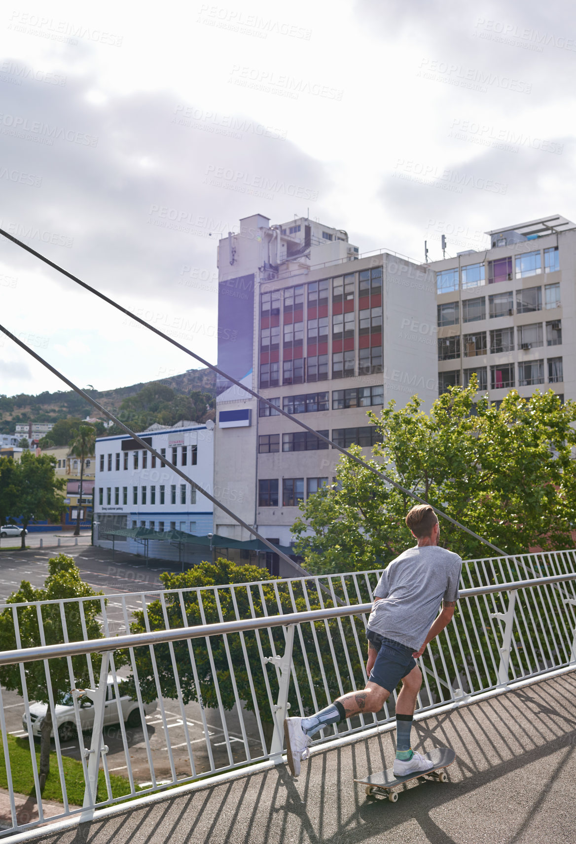 Buy stock photo Shot of skateboarders in the city