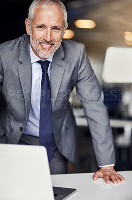 Buy stock photo Cropped portrait of a mature businessman in his office