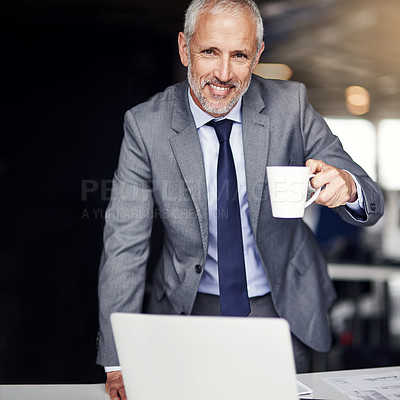 Buy stock photo Cropped portrait of a mature businessman drinking coffee in his office