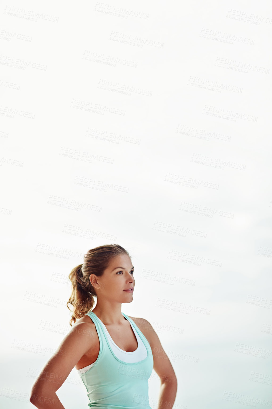 Buy stock photo Shot of a young woman exercising outside