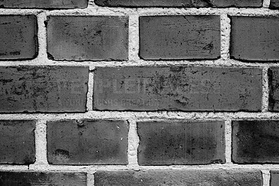 Buy stock photo Brick wall, black and white for closeup of home, house or city building with pattern and texture. Monochrome style, architecture exterior or traditional construction design on firm or old structure