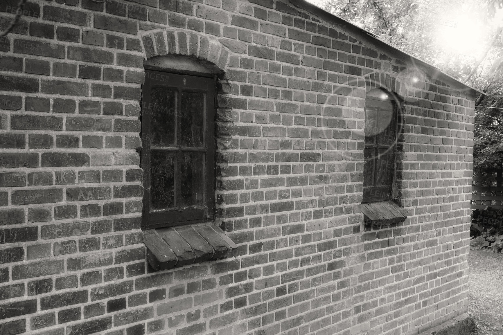 Buy stock photo Brick wall, black and white or window of home, house or city building with pattern and texture. Monochrome style, architecture exterior or traditional construction design on firm or old structure