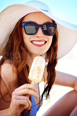 Buy stock photo Popsicle, smile and portrait of woman at beach on vacation, holiday and travel in summer hat. Happiness, ice cream and female tourist eating by ocean shore enjoying snack in Australia with sunglasses