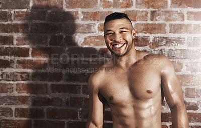 Buy stock photo Topless, portrait and happy man in gym for fitness, wellness and health with workout routine for muscular body. Training, male bodybuilder and pride for exercise, commitment and wellbeing by mockup