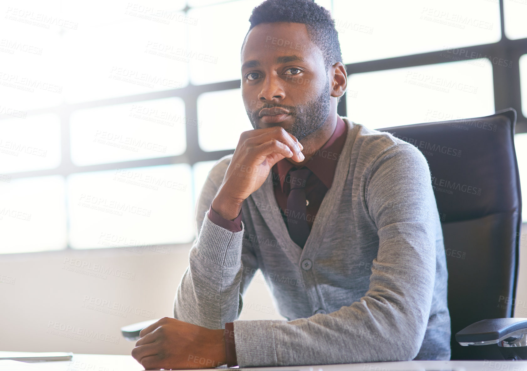 Buy stock photo Creative, black man and portrait by window in office of designer agency for work as publicist for media or public relations. Male employee, confident and serious for reputation management for company