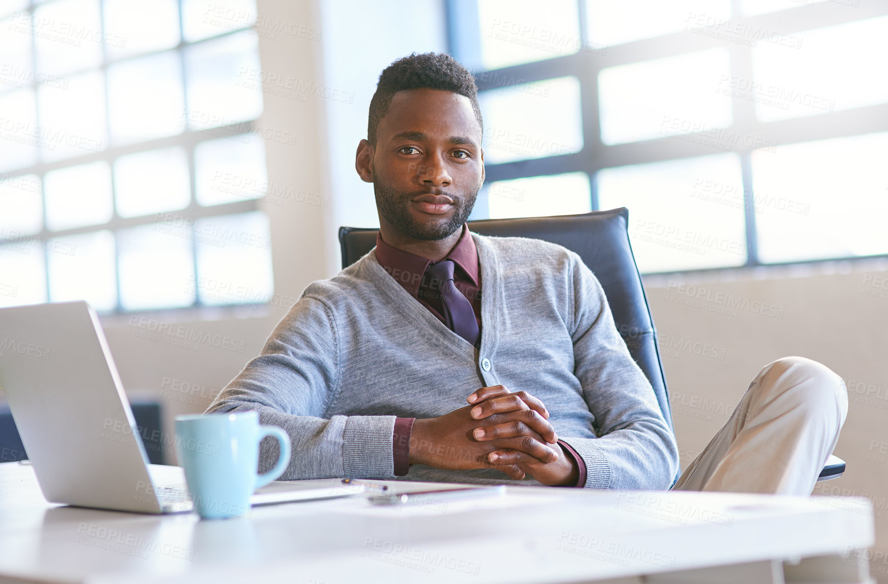 Buy stock photo Portrait, black man and laptop on desk in office for creative job as web developer or graphic designer for company. Person, technology and online for website update or software reset for agency
