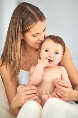 Buy stock photo Shot of a mother bonding with her adorable baby girl