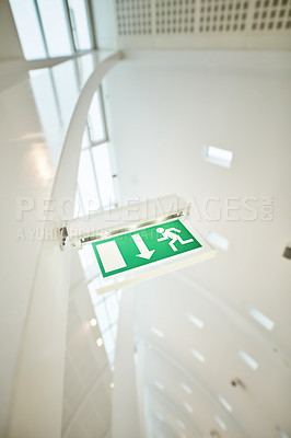 Buy stock photo Fire escape, texture and exit sign as background or wallpaper in corridor or office building. Symbol, guideline and below with safety, information and arrow for directions, emergency icon or warning