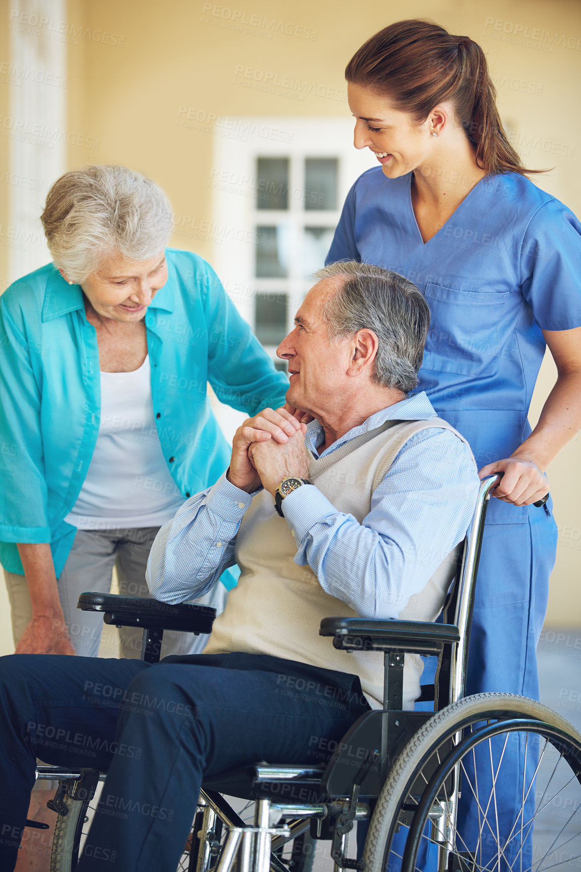 Buy stock photo Elderly wife, caregiver or old man in a wheelchair in hospital clinic helping a happy patient for support. Smile, mature woman or healthcare social worker talking to a senior person with a disability