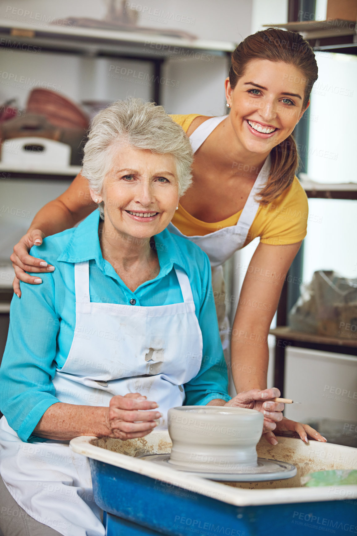 Buy stock photo Shot of a senior woman making a ceramic pot at a pottery class