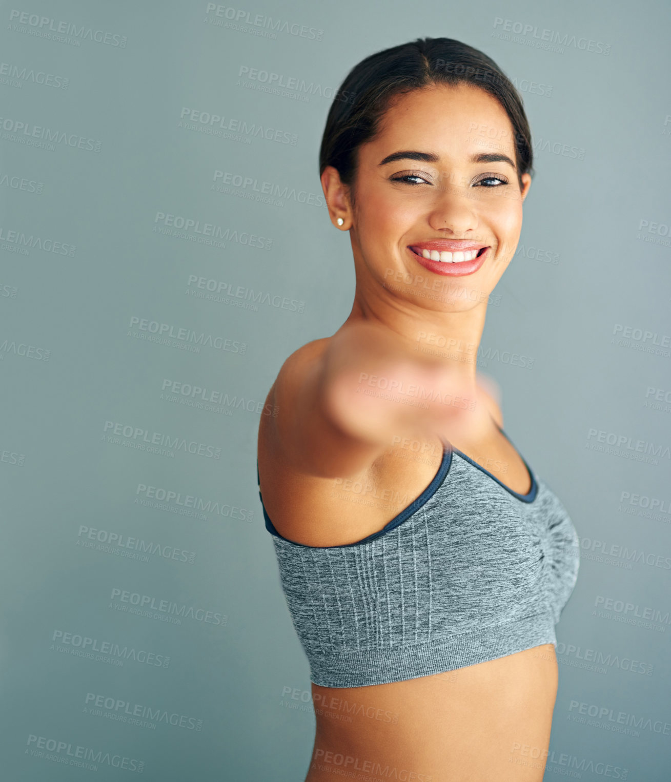 Buy stock photo Woman, portrait and stretch in studio or fitness, workout preparation or arm muscle or warm up on background. Smile, happy and training for mobility improvement in exercise, healthy body and wellness