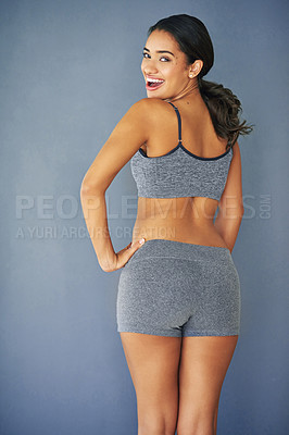 Buy stock photo Butt, fitness and portrait of woman in studio for Brazilian lift, plastic surgery and body enhancement. Happy, cosmetics and back of person with bum augmentation aesthetics by gray background.