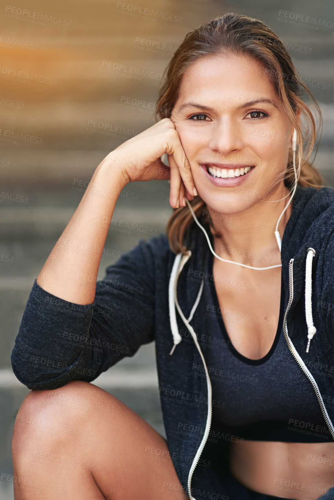 Buy stock photo Woman, earphones and smile for workout, portrait and outside for cardio health. Fitness, sports and rest for marathon training with audio or music, athlete person and streaming podcast playlist 