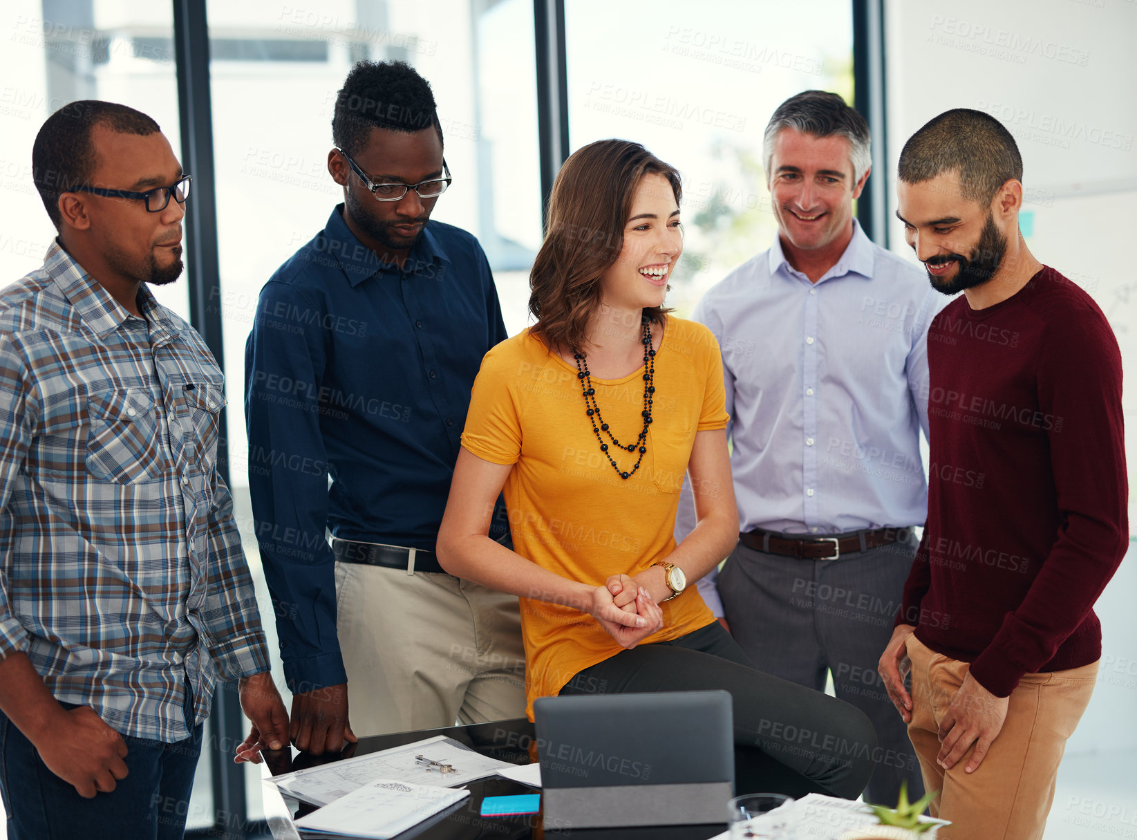 Buy stock photo Cropped shot of a group of businesspeople in a meeting