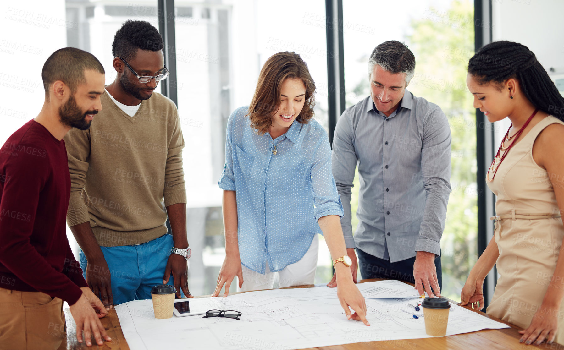 Buy stock photo Cropped shot of a group of architects in the boardroom