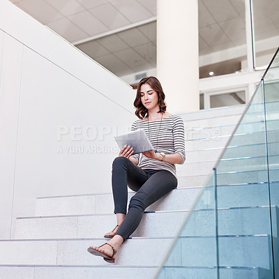 Buy stock photo Tablet, research and woman on the staircase in the office planning a corporate project. Technology, career and professional female employee working on company report with digital mobile in workplace.