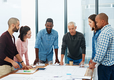 Buy stock photo Cropped shot of a group of architects in the boardroom