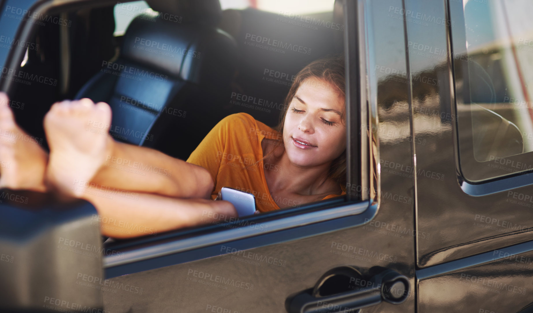 Buy stock photo Relax, window and woman in car with phone for social media post, connection and travel agent website. Female person, mobile internet and chilling in motor for booking vacation, web blog and chat app