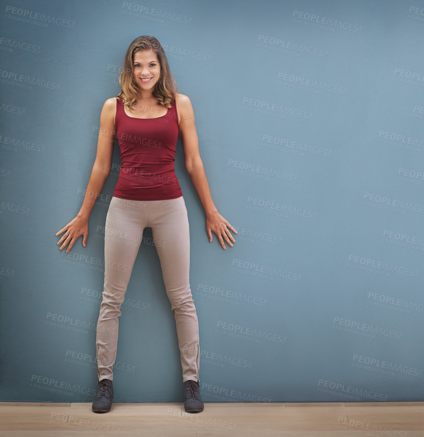 Buy stock photo Woman, fashion or portrait on blue background in studio with marketing mockup, advertising space or clothing sales deal. Smile, happy or trendy model on mock up backdrop wall for retail logo branding