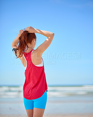 Buy stock photo Fitness, beach and running with a sports woman by the sea or ocean for summer exercise with mockup. Nature, freedom and workout with a female athlete or runner cardio training alone on the coast