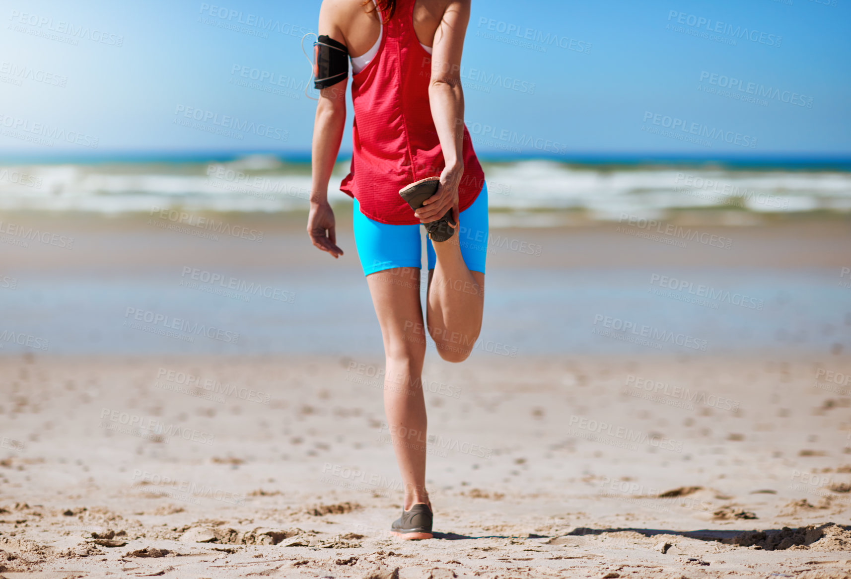 Buy stock photo Sports, beach and back of woman stretching for running with race, endurance and marathon training. Fitness, health and female athlete with leg warm up exercise by ocean for cardio workout in morning.