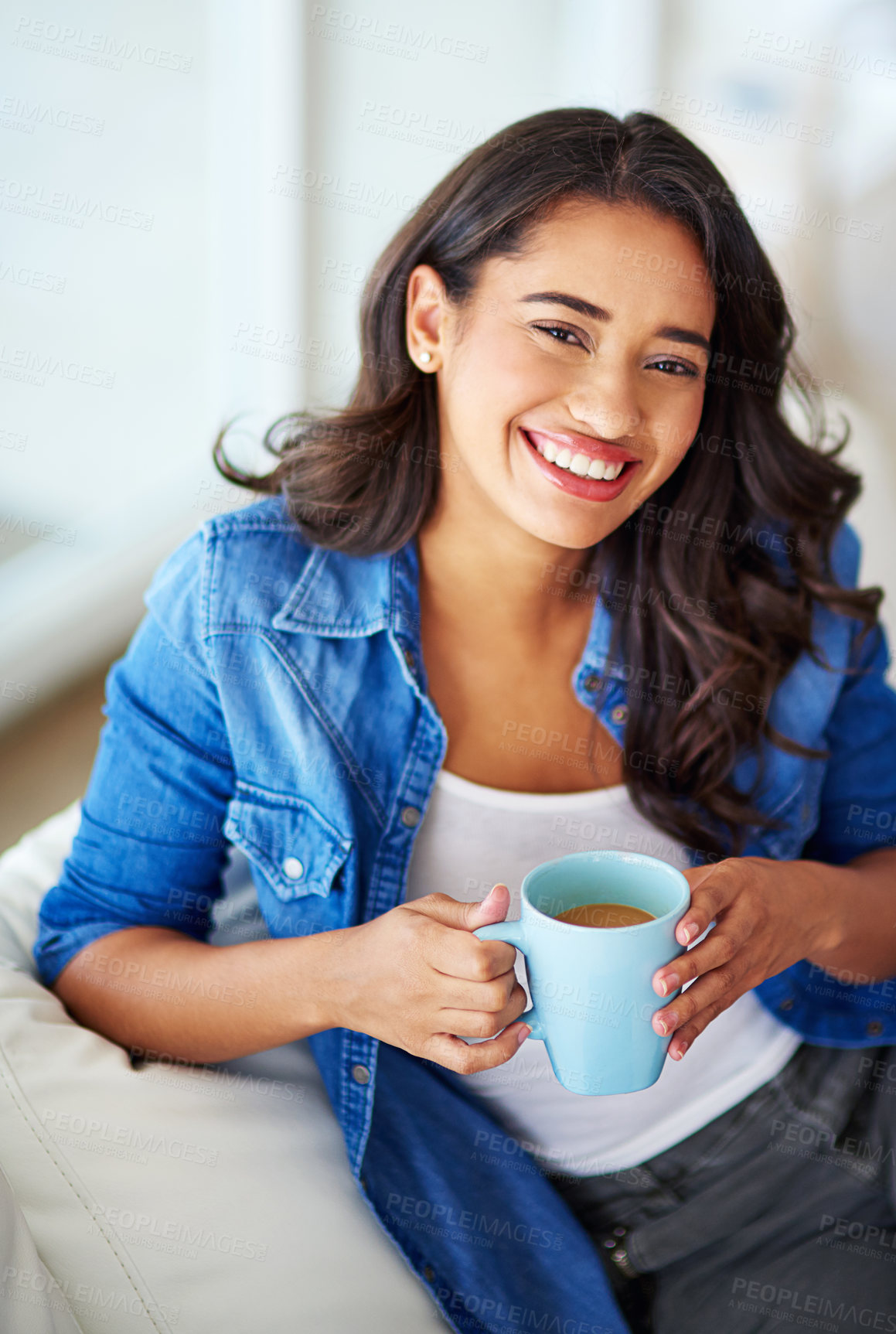 Buy stock photo Woman, portrait and smile with coffee in living room on sofa for relax with weekend in home. Happy, apartment and drink with tea mug or hot cocoa in morning with warm beverage, couch and positive