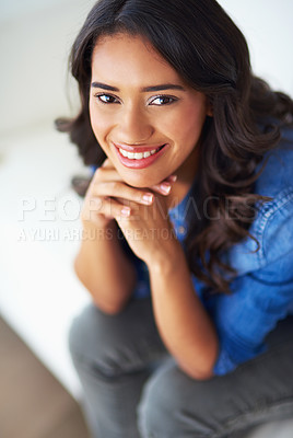 Buy stock photo Calm, happy and smile with woman in living room for satisfaction, relaxing and weekend. Face, rest and confident with portrait of female student on sofa at home for peace, carefree lounge break