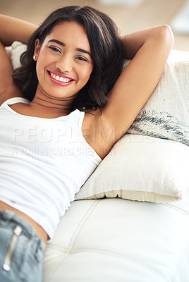 Buy stock photo Relax, portrait and woman on sofa, happy and smile while lying, resting and chilling in her home. Face, black woman and couch rest in a living room, cheerful and enjoying saturday indoors alone