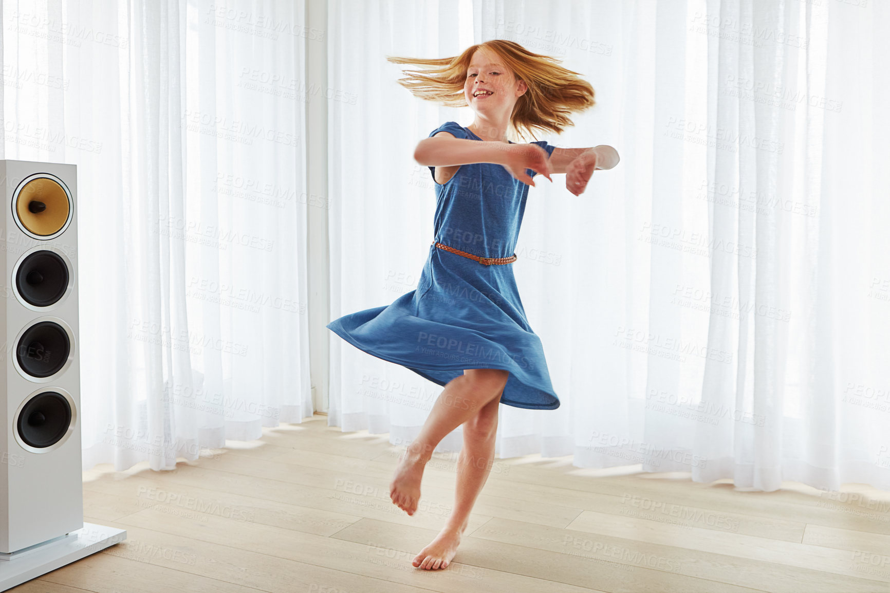 Buy stock photo Full length shot of a little girl dancing at home